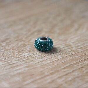 Swarovski Crystal May charm compatible with Pandora-style bracelets.